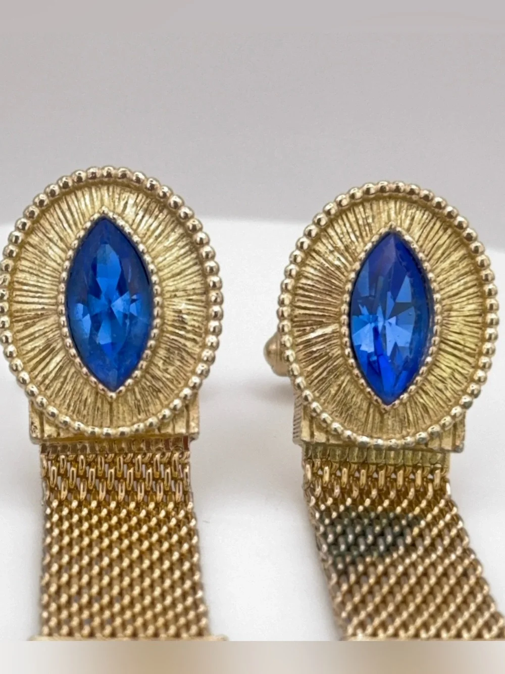 SWANK Gold-Tone Wrap Around Cuff Links with Blue Marquise Style Rhinestone